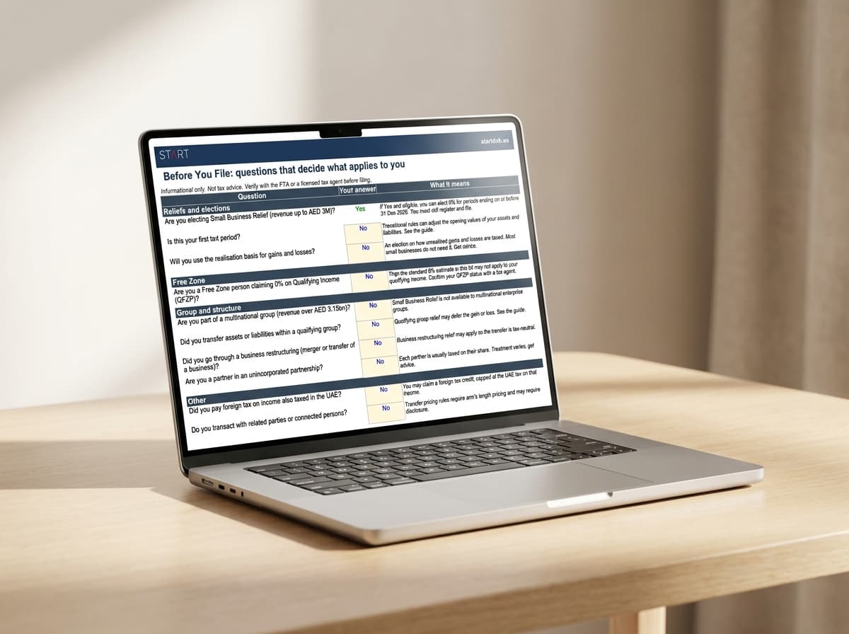 The START Corporate Tax spreadsheet open on a laptop, showing the before-you-file questions sheet