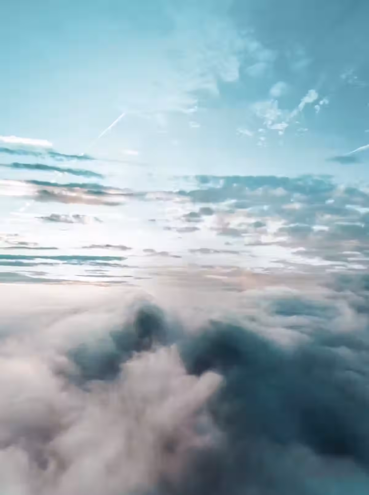 Cloudy blue sky with fog below, decorative