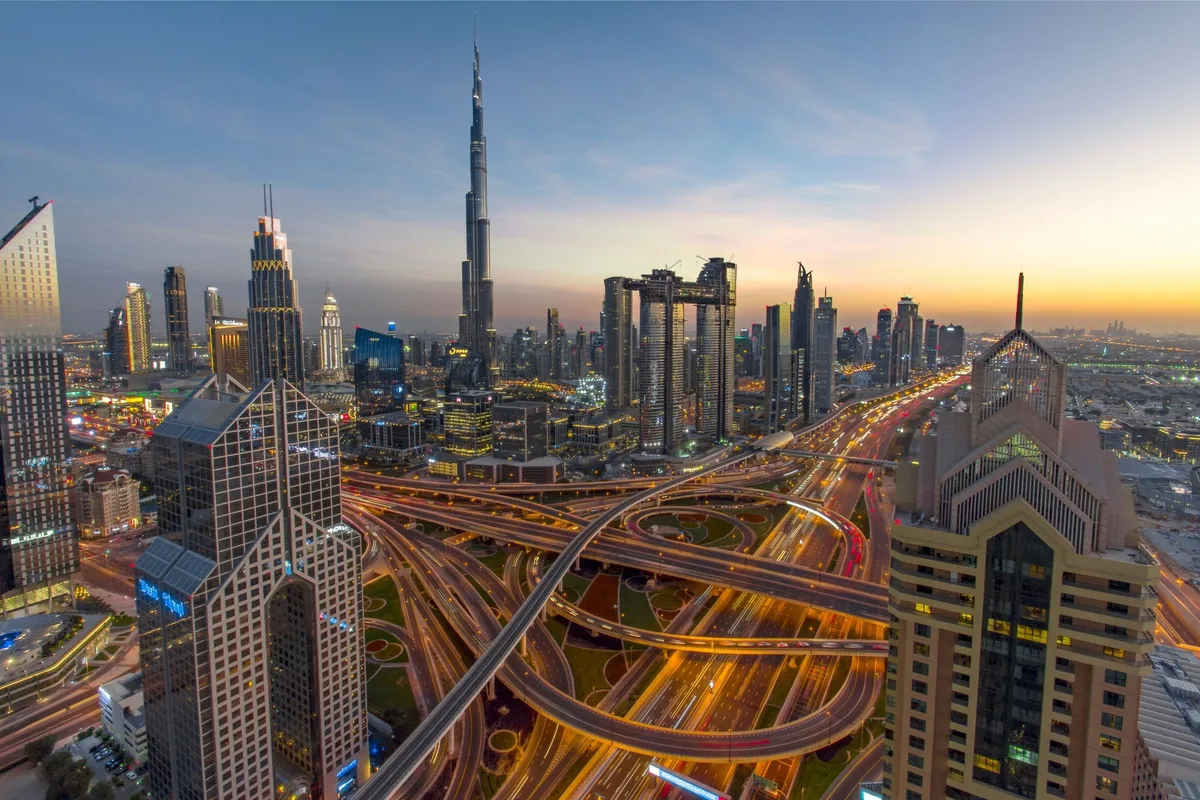 Aerial photo of Downtown Dubai skyline at dusk with Burj Khalifa
